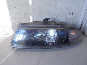 Used Headlight, left Mitsubishi Carisma 1.6i 16V Price € 30,00 Margin scheme offered by Hans Auto Onderdelen