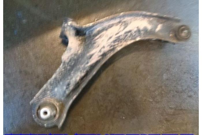 Front wishbone, left from a Nissan Micra (K12) 1.2 16V 2004