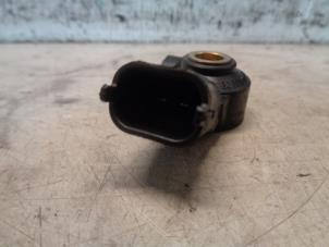 Klopfsensor van een Opel Corsa D 1.2 16V 2007