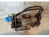 Throttle body from a Peugeot 106 II, 1996 / 2004 1.6 XS, Hatchback, Petrol, 1.587cc, 65kW (88pk), FWD, TU5JP; NFZ, 1996-05 / 1999-10, 1CNFZT; 1ANFZT; 1CNFZL; 1ANFZL 1997