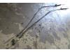 Parking brake cable from a Ford Focus 2 Wagon, 2004 / 2012 1.6 TDCi 16V 110, Combi/o, Diesel, 1,560cc, 80kW (109pk), FWD, G8DA; G8DB; G8DD; G8DF; G8DE; EURO4, 2004-11 / 2012-09 2007