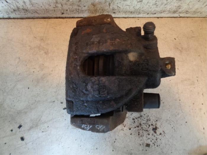 Brake caliper carrier