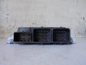 Engine management computer from a Ford Focus 3 Wagon 1.6 TDCi 2011