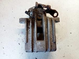 Used Rear brake calliper, left Volkswagen New Beetle (9C1/9G1) 1.6 Price € 30,00 Margin scheme offered by Hans Auto Onderdelen