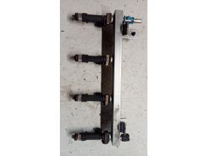Used Fuel injector nozzle Opel Corsa D 1.2 16V Price € 20,00 Margin scheme offered by Hans Auto Onderdelen