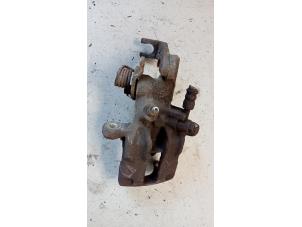 Used Rear brake calliper, left Nissan Almera (N16) 1.8 16V Price € 35,00 Margin scheme offered by Hans Auto Onderdelen