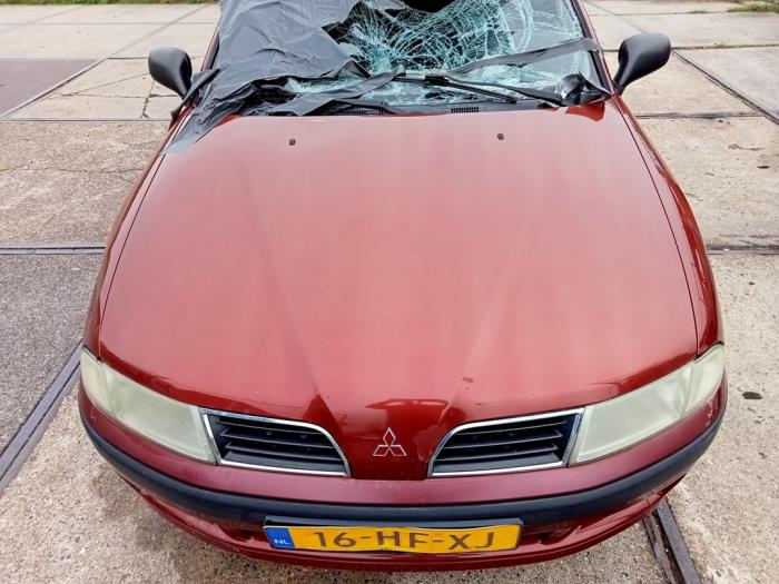Używane Maska Mitsubishi Carisma 1.8 GDI 16V Cena € 50,00 Procedura marży oferowane przez Hans Auto Onderdelen