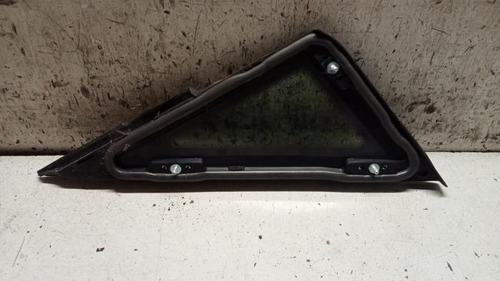Quarter light, front left from a Seat Ibiza IV (6J5) 1.6 TDI 90 2011