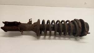 Used Front shock absorber rod, left Kia Rio (DC22/24) 1.5 16V Price € 35,00 Margin scheme offered by Hans Auto Onderdelen