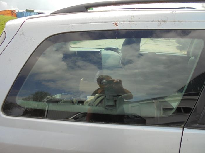 Zusätzliches Fenster 4-türig rechts hinten van een Ford Focus 1 Wagon 1.6 16V 2002
