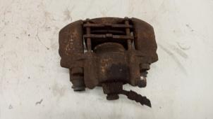 Used Front brake calliper, left Piaggio Porter 1.3i 16V Price € 35,00 Margin scheme offered by Hans Auto Onderdelen