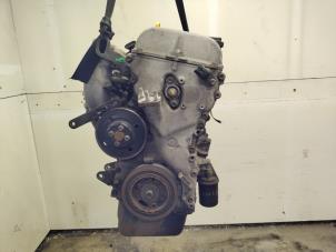 Engine from a Suzuki Ignis (FH) 1.3 16V 2002