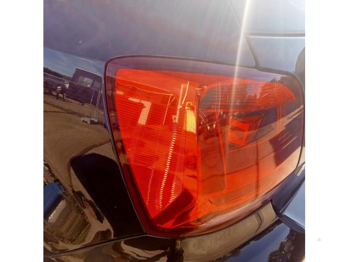 Taillight, left from a Volkswagen Polo V (6R) 1.4 TDI 12V 90 2016