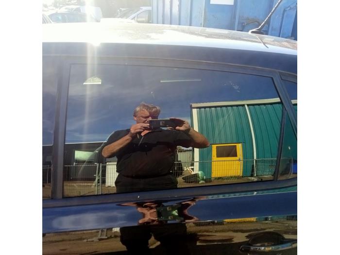 Rear door window 4-door, left from a Volkswagen Polo V (6R) 1.4 TDI 12V 90 2016