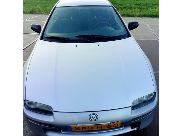 Używane Maska Mazda 323 F (BA14) 1.5i GLX,GT 16V Cena € 40,00 Procedura marży oferowane przez Hans Auto Onderdelen
