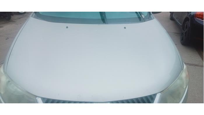 Używane Maska Mitsubishi Outlander (CW) 2.2 DI-D 16V 4x4 Cena € 125,00 Procedura marży oferowane przez Hans Auto Onderdelen