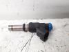 Injector (petrol injection) from a Opel Astra 2008