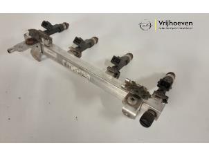 Used Fuel injector nozzle Opel Corsa D 1.2 16V Price € 20,00 Margin scheme offered by Autodemontage Vrijhoeven B.V.