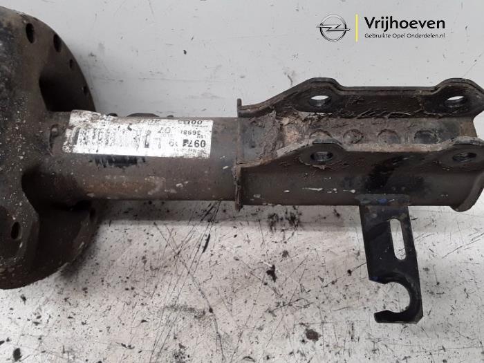 Fronts shock absorber, left from a Opel Astra J Sports Tourer (PD8/PE8/PF8) 2.0 CDTI 16V 160 2011