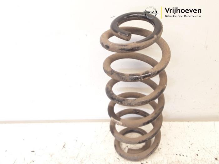 Rear coil spring from a Opel Astra K Sports Tourer 1.6 CDTI 136 16V 2017