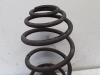 Rear coil spring from a Opel Astra H GTC (L08) 1.9 CDTi 120 2005