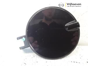 Used Tank cap cover Opel Astra H (L48) 1.4 16V Twinport Price € 15,00 Margin scheme offered by Autodemontage Vrijhoeven B.V.
