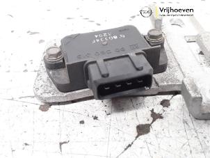 Zündmodul van een Opel Astra F (53/54/58/59) 1.4i GL/GLS 1994
