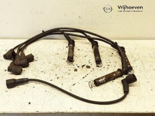 Used Spark plug cable set Opel Astra F (53/54/58/59) 1.4i GL/GLS Price € 10,00 Margin scheme offered by Autodemontage Vrijhoeven B.V.