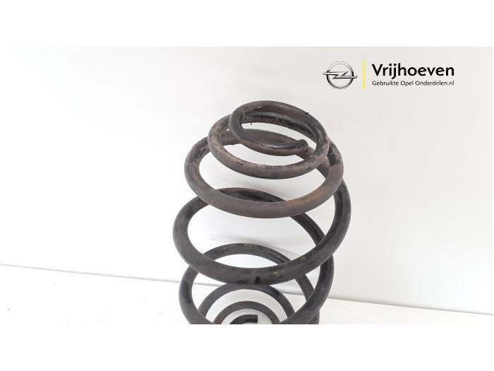 Rear coil spring from a Opel Astra H (L48) 1.6 16V Twinport 2004