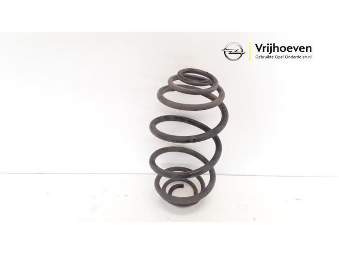 Rear coil spring from a Opel Astra H (L48) 1.6 16V Twinport 2004