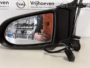 Usados Retrovisor externo izquierda Opel Zafira (F75) 1.6 16V Precio € 25,00 Norma de margen ofrecido por Autodemontage Vrijhoeven B.V.