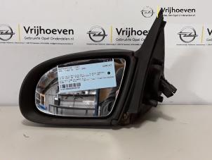 Używane Lusterko zewnetrzne lewe Opel Tigra Cena € 15,00 Procedura marży oferowane przez Autodemontage Vrijhoeven B.V.