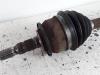 Front drive shaft, left from a Opel Astra K 1.4 Turbo 16V 2017