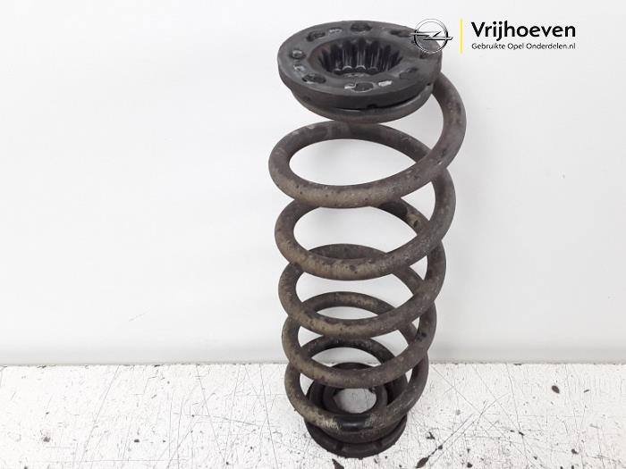 Rear coil spring from a Opel Astra K Sports Tourer 1.6 CDTI 110 16V 2018