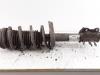 Fronts shock absorber, left from a Opel Corsa D, 2006 / 2014 1.4 16V Twinport, Hatchback, Petrol, 1.364cc, 66kW (90pk), FWD, Z14XEP; EURO4, 2006-07 / 2014-08 2008