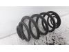 Rear coil spring from a Opel Astra J GTC (PD2/PF2) 1.4 Turbo 16V ecoFLEX 140 2014