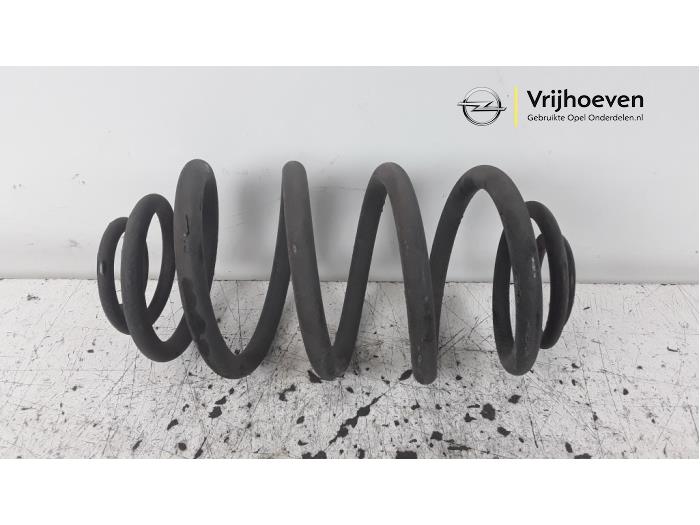 Rear coil spring from a Opel Astra J GTC (PD2/PF2) 1.4 Turbo 16V ecoFLEX 140 2014