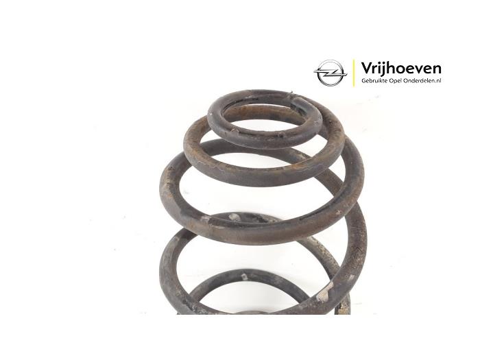Rear coil spring from a Opel Astra H (L48) 1.6 16V Twinport 2005