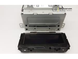 Used Radio module Opel Astra J GTC (PD2/PF2) 1.4 Turbo 16V ecoFLEX 140 Price € 70,00 Margin scheme offered by Autodemontage Vrijhoeven B.V.