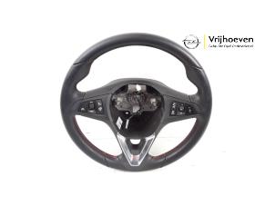 Used Steering wheel Opel Corsa E 1.0 SIDI Turbo 12V Price € 75,00 Margin scheme offered by Autodemontage Vrijhoeven B.V.