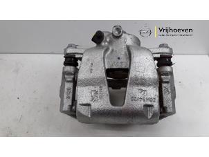 Used Front brake calliper, right Opel Adam 1.2 16V Price € 50,00 Margin scheme offered by Autodemontage Vrijhoeven B.V.