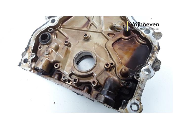 Timing cover from a Opel Agila (B) 1.2 16V 2011