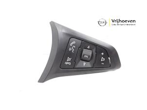 Used Steering wheel mounted radio control Opel Corsa E 1.2 16V Price € 20,00 Margin scheme offered by Autodemontage Vrijhoeven B.V.