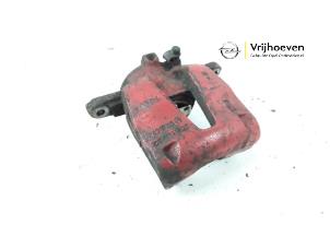 Used Front brake calliper, left Opel Adam 1.2 16V Price € 25,00 Margin scheme offered by Autodemontage Vrijhoeven B.V.