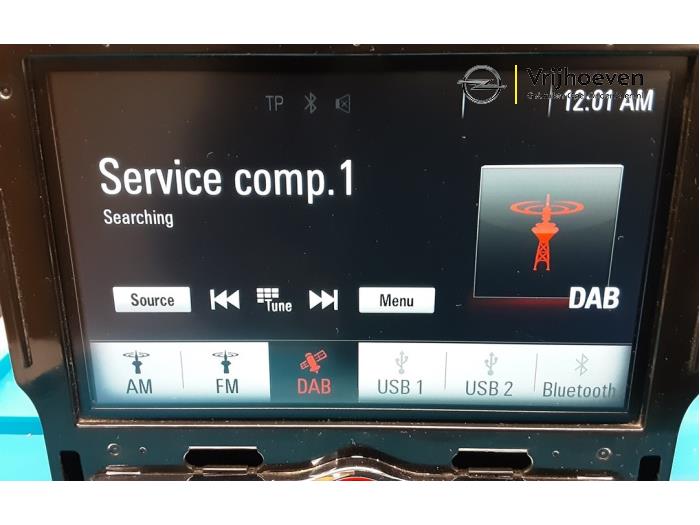 Radio van een Opel Corsa E 1.4 16V 2016