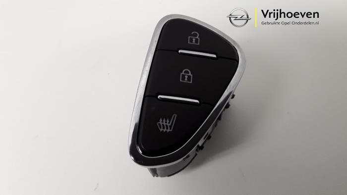 Interruptor de calefactor de asiento de un Opel Corsa E 1.4 16V 2015