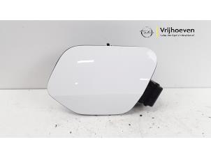 Used Tank cap cover Opel Corsa F (UB/UH/UP) 1.5 CDTI 100 Price € 40,00 Margin scheme offered by Autodemontage Vrijhoeven B.V.