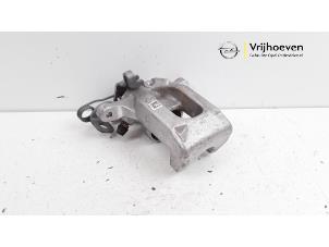 Used Rear brake calliper, left Opel Corsa F (UB/UP) 1.5 CDTI 100 Price € 50,00 Margin scheme offered by Autodemontage Vrijhoeven B.V.