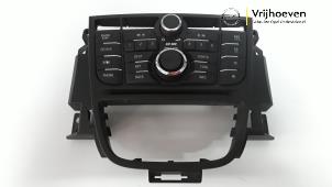 Używane Panel obslugi radia Opel Astra J (PC6/PD6/PE6/PF6) 1.3 CDTI 16V EcoFlex Cena € 40,00 Procedura marży oferowane przez Autodemontage Vrijhoeven B.V.