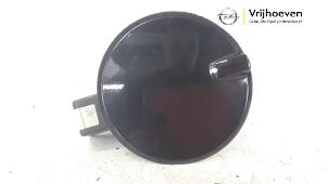 Used Tank cap cover Opel Astra H (L48) 1.7 CDTi 16V Price € 15,00 Margin scheme offered by Autodemontage Vrijhoeven B.V.